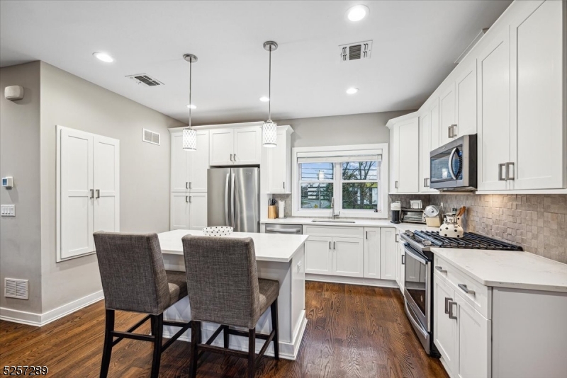 2018 Built Townhouse at The Stonybrook Brownstones At Fairfield, is ready to welcome you.  Featuring 2 bedrooms and 2.5 baths, three levels. The 1st level introduces you to convenience with a 1-car garage, a dedicated laundry area, and front and back doors leading to a shared yard. On the 2nd level, it's bright & airy open floor plan, features hardwood floors throughout.  Stunning kitchen with center island, stainless steel appliances, quartz countertops, and a pantry. The large family room with hardwood floors and a powder room. Moving to the 3rd level, where the primary bedroom suite with 2 closets and a primary bath featuring an extra-large ceramic tile shower. The 2nd bedroom with its own bath. Plenty of shared parking space available for friends. Lease this contemporary townhouse for $3,500/month with a minimum 1-year commitment. Great location: Top rated schools, close to restaurants, shopping, public library, Trader Joe's, and Whole Foods. Close to major highways & NJ Transit Bus and Train Center. Tenants responsibilities include: 1st month rent, 1.5 month security, 1 month Brokers, credit report/appl, 1 yr lease, renters insurance. No smoking. call about pets.