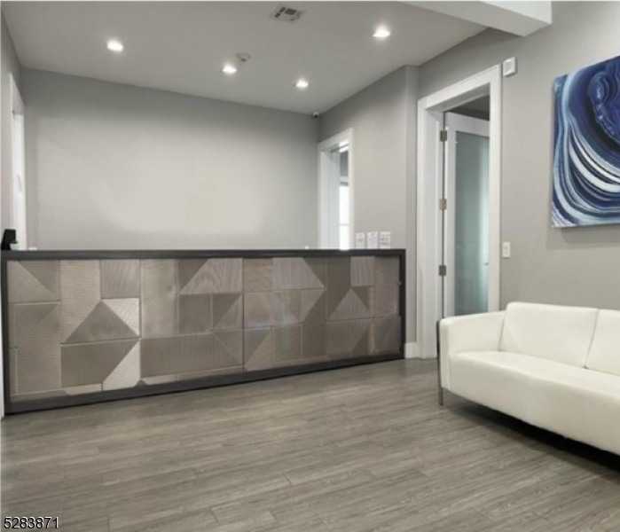 This meticulously designed multi-floor office offers unparalleled convenience and accessibility, making it an ideal choice for your business needs.   This site enjoys proximity to major highways, including Routes 80, 46, 21, 3 and GSP.  This strategic location ensures easy access for employees and clients alike, facilitating smooth commuting and enhancing business opportunities.