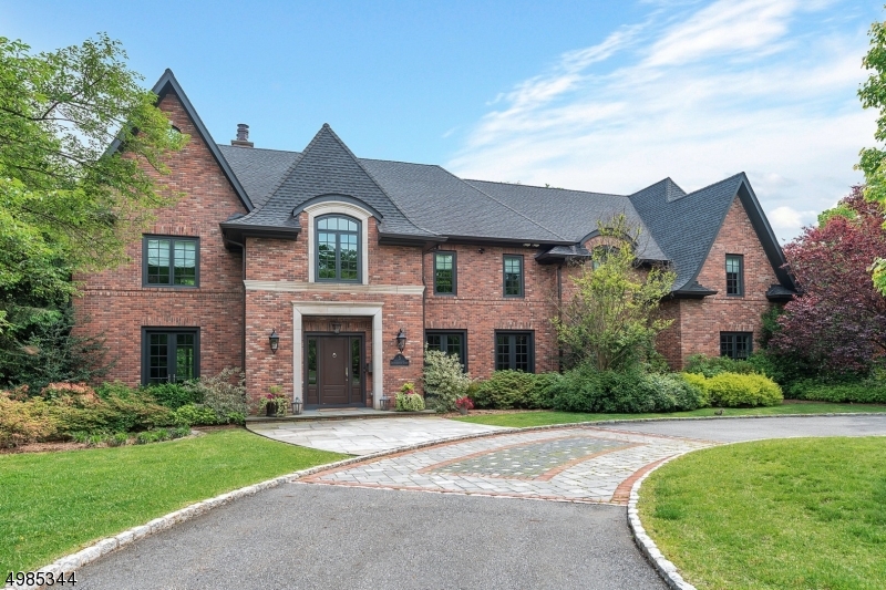 This gorgeous Custom home built in 2013 with 7,000 square feet of beautiful space to meet the needs and style of living for today's discerning buyers. There are many special features and perks. Resort Style Living. The outdoor space features an amazing property with heated, saltwater in-ground pool, hot tub, outdoor kitchen, pool house with powder room. There is a gorgeous large patio.