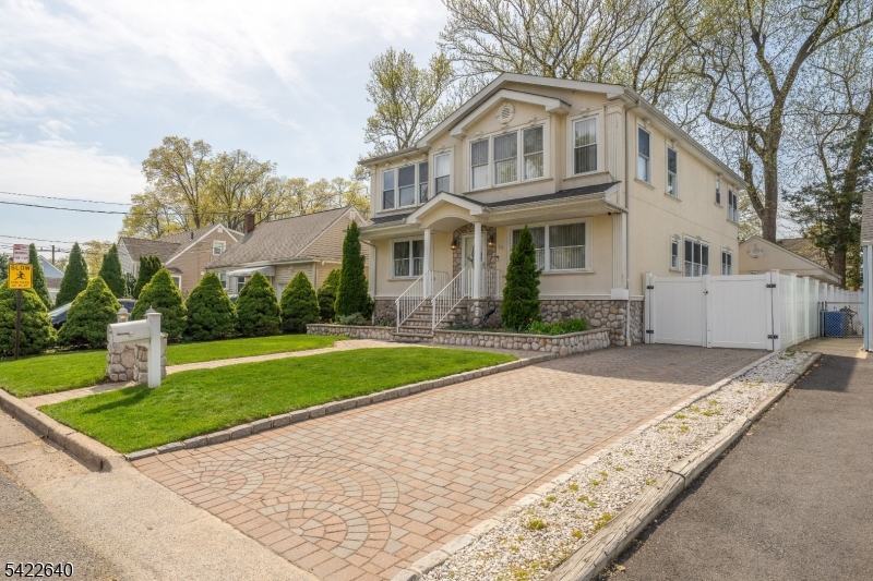 Welcome to this beautifully maintained and  thoughtfully designed home, that perfectly blends elegance, comfort, and functionality. The inviting living room spaces  showcase gleaming                                                                          hardwood floors, flowing. The gourmet kitchen is a true centerpiece, featuring stainless steal appliances, custom cabinetry and ample space for cooking and  entertaining, kitchen outfitted with top-of-the-line stainless steel appliances and a center island perfect for casual seating. Formal   dining room space. . A generous great room boasts vaulted ceilings, rich hardwood floors, . The luxurious primary  suite  offers a private  retreat with a private dressing room, and  luxurious full bath with jacuzzi tub and stall shower, also, with a massive closet to meet all your storage needs. Hardwood floors throughout 1st and second floor.  Open floor space. 4 generous sized bedrooms. New roof 2026 , The home also features finished basement with, full bath, and  high ceilings-ideal for a home gym, recreation area, or additional living space. .Let your imagination decide its purpose! . This house is move in ready and designed to impress. The property  setting in a desirable neighborhood that adds to the home's curb appeal and overall value. Don't miss the opportunity to make this remarkable home yours! Featuring  throughout, this home was designed with an extensive list of quality