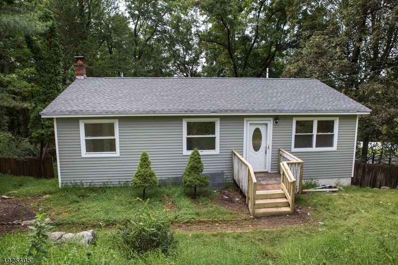 Beautifully Renovated 3 Bedroom 2 Full Bath Ranch with featuring a Full Finished Basement and a spacious Eat-in Kitchen. SELLER HAS INSTALLED A BRAND NEW SEPTIC FOR THE BUYERS.