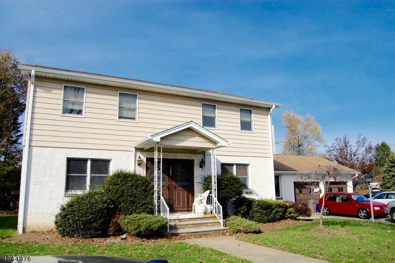 Oversized first floor unit conveniently located in Boonton.  This home has two huge bedrooms with a living room that can be converted into an additional bedroom. The family room's vaulted ceilings lead you to the cozy brick fireplace. From here, there is an entrance to your garage spot (3+ car parking) and the front door.  The eat-in kitchen also has a desk space and a hall pantry.  In the basement, you'll find high ceilings with an additional full bath, laundry, and a large office space/den.  Come see this gem today!