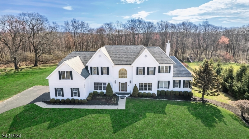 STUNNING Custom  Toll Brothers Exeter Model Home with over $200K recent upgrades nestled on level 1.5  acre cul-de-sac backing to woods for privacy and plenty of room for a pool! You will fall in love with this Beauty upon entering the 2-story foyer with  gleaming floors and open-concept floor plan, great for entertaining.  Spectacular 4 or 5 bedrooms, 3.5 updated baths, possible in-law suite.  First floor features impressive culinary kitchen, subzero refrigerator, 2 dishwashers, 5-burner gas cooktop with downdraft ventilation, warming drawer, ss appliances, island, and walk-in pantry.  Gorgeous breakfast room with lots of windows and natural lighting with amazing nature views.  Expanded formal living room and dining rooms with extensive moldings, family room with 2-sided fireplace, wonderful conservatory, fabulous sunroom, office/den, laundry room, and powder room, complete first level.  Fantastic Primary Suite with 2 walk-in closets, sumptuous bath, Jack & Jill bedrooms, Princess Suite with private bath and attached  bonus  room, for perfect in-law suite, plus 2nd laundry room for convenience and functionality.  MUST  BE PREAPPOVED A B-4 SHOWING! Step outside on your 2-tier deck with  gorgeous level lot and nature galore!   Full WALKOUT basement with large windows and rough plumbing,  can be finished for additional living space, if desired. Absolutely pristine home waiting for you!