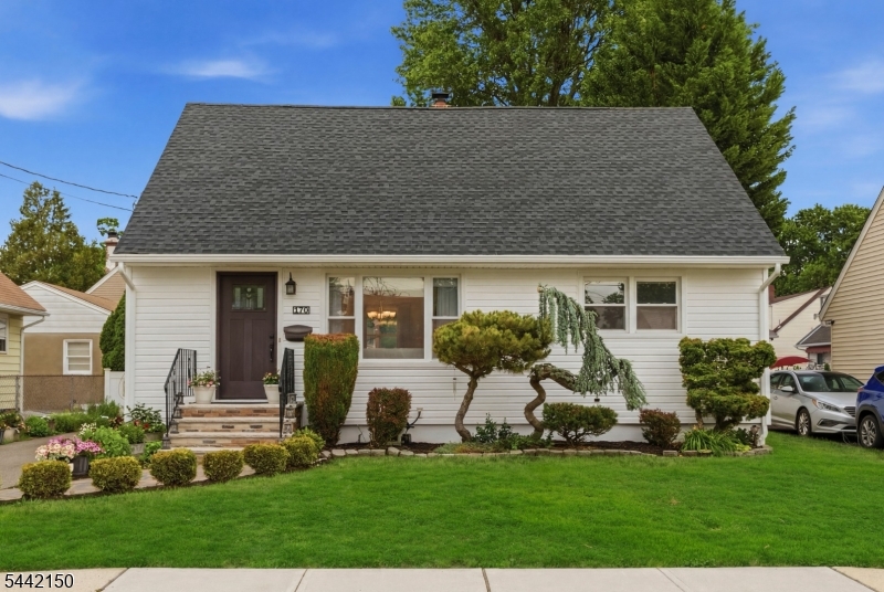 Welcome to this immaculate 3"4 BR Side-Hall Colonial Cape, with extensive upgrades throughout and perfectly situated in a quiet residential neighborhood. As you step inside, you're greeted by newly installed hardwood floors and custom moldings that flow seamlessly into an updated kitchen featuring stylish ceramic tile and SS appliances.  Flexible living options await, with potential primary bedrooms on both the first and second floors. No detail has been overlooked this home features major improvements including newer siding and roof (both 4 years old), central air-conditioning, and a new water heater. A rear dormer maximizes upper-level space, while the fully finished basement offers a spacious recreation room, laundry room, second kitchen, and an additional storage room ideal for an impressive pantry.  Step outside to your beautiful landscaped private backyard oasis, complete with a patio that's perfect for outdoor entertaining.