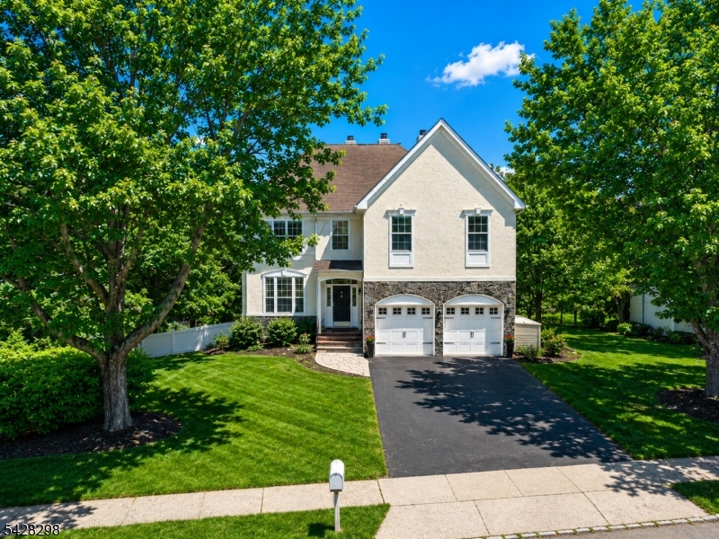 Located on a quiet cul-de-sac in the highly desirable Lake Cushetunk community, this spacious and sun-filled center hall Colonial offers the perfect blend of comfort, style, and convenience. Featuring a bright open floor plan, this home boasts two fireplaces one in the living room and one in the family room creating warm and inviting spaces for both everyday living and entertaining.The kitchen is well-appointed with 42" cabinetry, Corian countertops, Pantry and a separate breakfast area that opens seamlessly to the main living space. Upstairs, the primary suite includes a private sitting area, providing a perfect retreat at the end of the day. A versatile fifth bedroom offers flexibility for guests, a home office, or additional living space.The finished walkout basement has been updated, adding even more functional living space. Step outside to enjoy a fenced-in yard complete with a hot tub ideal for relaxing or entertaining.Lake Cushetunk offers an exceptional lifestyle with all public utilities, a community clubhouse, swimming pool, tennis courts, and playground. Conveniently located with easy access to major highways and public transportation, this home truly has it all.