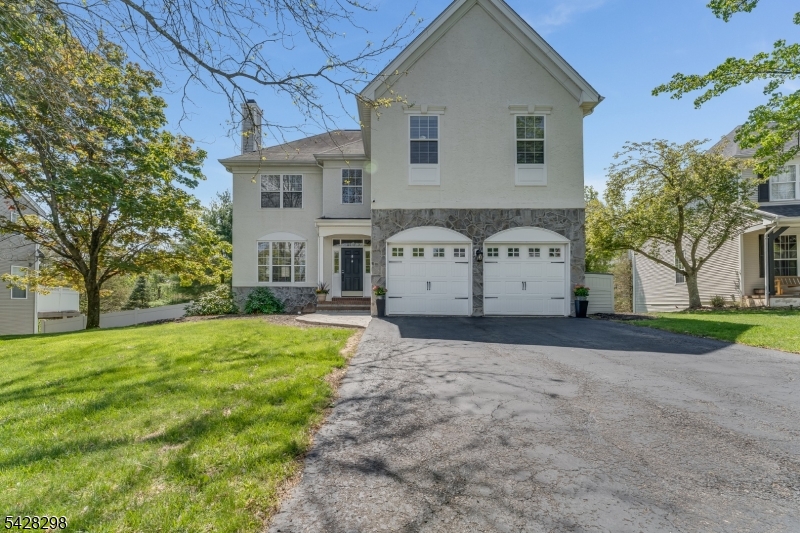 Located on a quiet cul-de-sac in the highly desirable Lake Cushetunk community, this spacious and sun-filled center hall Colonial offers the perfect blend of comfort, style, and convenience. Featuring a bright open floor plan, this home boasts two fireplaces one in the living room and one in the family room creating warm and inviting spaces for both everyday living and entertaining.The kitchen is well-appointed with 42" cabinetry, Corian countertops, Pantry and a separate breakfast area that opens seamlessly to the main living space. Upstairs, the primary suite includes a private sitting area, providing a perfect retreat at the end of the day. A versatile fifth bedroom offers flexibility for guests, a home office, or additional living space.The finished walkout basement has been updated, adding even more functional living space. Step outside to enjoy a fenced-in yard complete with a hot tub ideal for relaxing or entertaining.Lake Cushetunk offers an exceptional lifestyle with all public utilities, a community clubhouse, swimming pool, tennis courts, and playground. Conveniently located with easy access to major highways and public transportation, this home truly has it all.