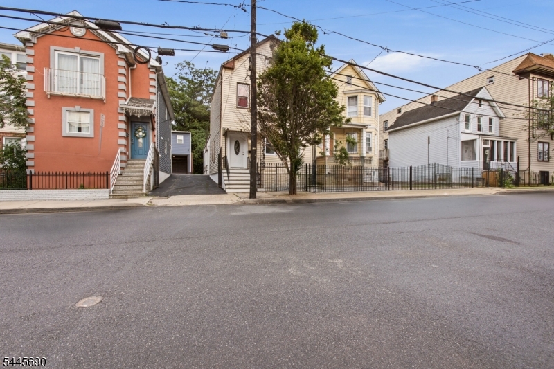 Welcome to 65 Highland Ave, a spacious 2-family home offering exceptional versatility and endless possibilities in Newark. The first unit features three bedrooms and one full bathroom, along with a bonus basement level that includes four additional rooms and one full bathroom, providing incredible flexibility for recreation, a home office, storage, gym, or other everyday uses. The second unit offers two bedrooms and one full bathroom, while its bonus finished attic level features an additional bedroom and full bathroom, creating even more functional living space. Both units showcase bright Living/Dining Room combinations and functional kitchens designed for comfortable everyday living. With two separate bonus spaces, generous layouts, and endless flexibility throughout, this property presents an outstanding opportunity for homeowners and investors alike. Conveniently located near transportation, shopping, parks, and major commuter routes, this is a rare multi-family opportunity you won't want to miss. Grab it before it's gone!