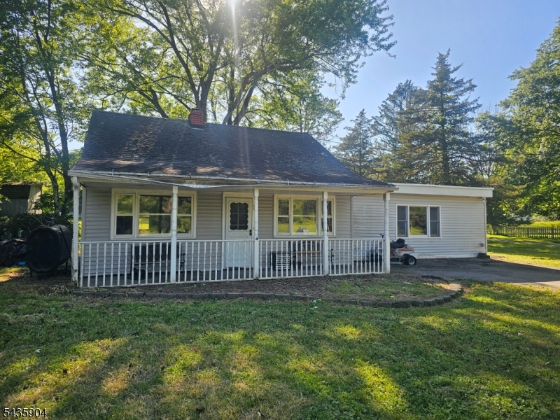Perfect opportunity to fix and flip or obtain a property in a fairy tale location at a low cost. Property needs full renovation. Make an offer today and make this yours! Location is directly across the street from the beautiful Foran Fields Park! Only minutes from Round Valley Recreation Area for your summer lakeside cookouts and swimming! It is a 45-minute drive from Newark Airport, 1 hour from Manhattan, and 1 hour from New Jersey beaches. The area is picturesque with one of the most scenic drives along the way. This home has excellent potential for a starter home, forever home, income producing rental, fix and flip, or tear it down and use the 0.42 acres to build your dream home in a dream location! The home has 2 bedrooms on the second floor, 1 large bedroom on the first floor, open concept dining room next to the kitchen. The large living room has a built-in fireplace to set the mood after a long day. The open front porch area is perfect to enjoy watching the little league baseball games while sipping an ice-cold lemonade during the hot summer days! The double driveway gives you plenty of space for your guests to park in when they visit. The huge lot with storage shed included allows your imagination plenty of room to expand on the possibilities of an outdoor oasis retreat! Bring your ideas and contractor and let's get started on making your dream come true with this property! Easy to schedule, bring all offers today!