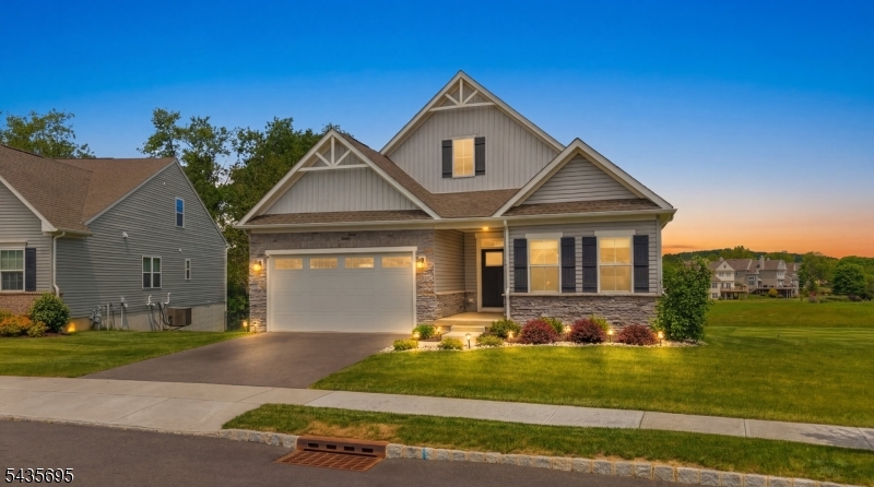 Welcome home to this stunning, newly built (2023) gem in Ryan's Homes Hawke Point, a thriving 55+ community! Experience modern living with an open-concept layout, where a spacious kitchen featuring a large center island flows seamlessly into cozy yet expansive living areas. The finished walk-out basement provides abundant extra space for entertaining and gathering. Step outside to your private extended two tier deck, offering breathtaking views overlooking the golf course. As you walk through, take note of the large walk-in closet and private bathroom ensuite in the primary bedroom with easy access of a laundry room right outside your door. Create flexible use of the third bedroom as a comfort TV/media room, office, craft space, or workout room. Experience the convenience of one-level everyday living in this custom built ranch model home, including an approximate 3,054 sq ft of renovated space plus another 1,107 sq ft of storage and garage room. Golf, swim and socialize in your new backyard playground. Easy access to Hawke Point Golf club, clubhouse, ShopRite, stores, restaurants, medical facilities and local route 31. Easily hop to Route 78 or Route 80 for commuting. All you have to do is move in. Keep the furniture and decor if you'd like.