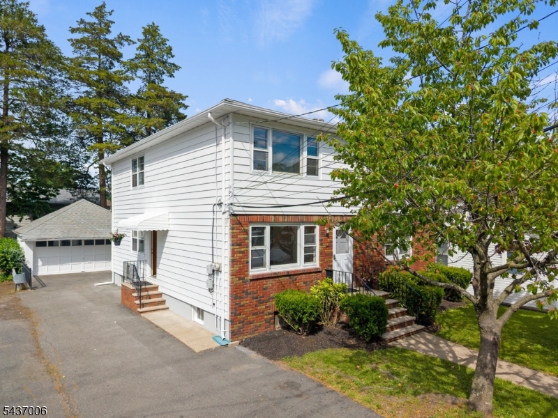 Welcome to this exceptional two-family home nestled in the desirable Delawanna section - an outstanding opportunity for owner-occupants and investors alike. The property features a generous total of 6 bedrooms and 3 full bathrooms spread across two well-appointed units, offering flexible living arrangements and strong income potential. The fully finished walk-out basement adds valuable bonus living space-ideal for a recreation room, home office, or additional storage. A detached 2-car garage provides ample parking and storage, a rare and coveted feature in this area. Commuters will love the unbeatable convenience-the NY bus stop is right across the street, putting New York City within easy reach. The surrounding neighborhood is packed with everyday essentials, including shops, top-rated schools, and parks just moments away. Whether you're an owner-occupant or building your investment portfolio, this property checks every box.