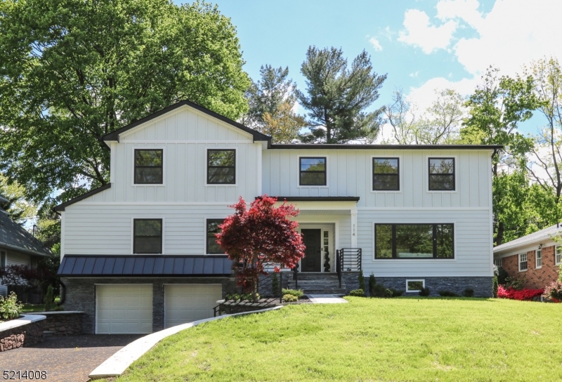 Welcome to this meticulously renovated & expanded modern Craftsman home (approx 4,000 sqft) nestled on one of the most desirable tree-lined streets in Upper Montclair, with Yantacaw Brook Park just moments away! This fabulous open floor plan is clean & sophisticated yet warm & inviting.The large designer gourmet eat-in kitchen is equipped w/all the modern amenities, high-end appliances, walk-in pantry & elegant lighting.The formal living room w/modern accent wall flows into formal dining room equipped w/a custom wet bar w/additional storage & a custom wine fridge.The large family room has an elegant custom electrical fireplace 3D wall.An office/fifth bedroom, designer parlor bath & an all seasoned sun-filled sun room round out the first floor.The second floor has four spacious bedrooms including a primary suite w/a custom electric fireplace accent wall, a luxurious modern bathroom with soaking tub, separate marble shower & a custom walk-in closet.The large Jack 'n Jill bathroom connects two of the spacious bedrooms w/ additional closet space.The finished lower level has a full bathroom, laundry room, custom mudroom bench off the attached 2 car garage w/addt'l storage space that can be used as a home gym.The exterior features Jame Hardie board cement siding & stone exterior finishes, new roof, new gutters & oversized windows.The new spacious leveled backyard offers a paver patio & pergola ready for you to unwind!Close to parks,NYC transportation & Montclair's lovely downtown.