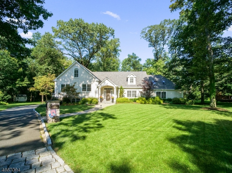 BEAUTIFULLY APPOINTED CUSTOM HOME W DRAMATIC OPEN FLOOR PLAN  BOASTS MODERN GOURMET KITCHEN WITH CRISP WHITE CABINETRY, HIGH END APPLIANCES INCLUDING WINE FRIDGE & HUGE CENTER ISLAND. ADJACENT IS THE STUNNING GREAT ROOM WHICH BOASTS HIGH CEILINGS W WOOD BEAMS, SKYLIGHTS & GAS FIREPLACE. THIS GEM FEATURES 6  BEDROOMS, 4 BEAUTIFULLY UPDATED BATHS, 2 CAR GARAGE & PROVIDES SPACIOUS ELEGANCE THROUGHOUT. THIS HOME ALSO HAS A  SEPARATE ENTRANCE TO POSSIBLE IN LAW SUITE OR OFFICE. TOP FLOOR HAS LARGE MEDIA ROOM & FINISHED BASEMENT IS THE PERFECT AREA FOR RECREATION OR EXERCISE ROOM.  SPECIAL ATTENTION TO DETAIL THROUGHOUT INCLUDING EXTENSIVE WAINSCOTING, HIGH END LIGHTING & THE PERFECT COLOR PALATE ALL OF THIS CONVENIENTLY LOCATED MINS TO EXCITING DOWNTOWN MORRISTOWN & TRAIN STATION.