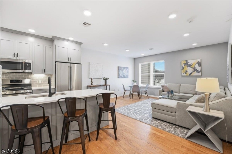 **SPECIAL OFFER - PARKING INCLUDED** Discover Liberty Place - Bloomfield's newest boutique condo community. Now selling our penthouse level. Each residence features solid oak floors, 9ft ceilings, quartz countertops, GE appliances, in-unit washer/dryer, tankless hot water heater, nest thermostat, and primary bath with dual sinks. One deeded parking space available for purchase and can be included in the mortgage. Building amenities include a rooftop deck, wellness gym with NordicTrack equipment, and bike storage. HOA covers water, landscaping and snow removal, garbage and recycling, master insurance, common area maintenance, and building reserves. Located in Bloomfield at the border of Montclair and Glen Ridge, you are in the center of it all! Amazing central location, close to restaurants, shopping, parks and entertainment and just a quick 35 minute train ride to NYC. 5-year tax abatement. 10-year New Construction Warranty. Pets allowed.