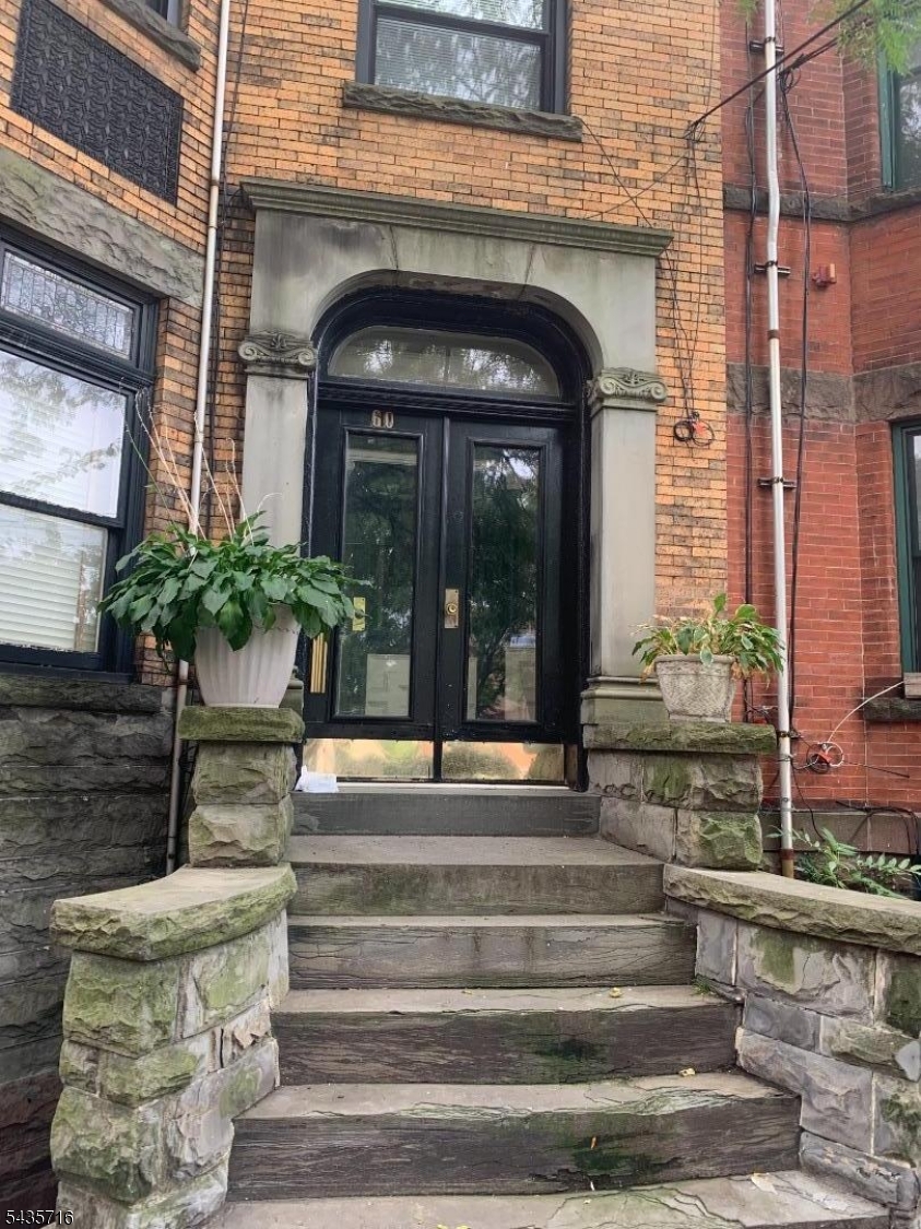 Location, Location Location! Welcome to this stunning 2 BR, 2.5 baths in the central ward of Newark's arts, culture, education and entertainment district. Just minutes away from Manhattan by NJ Transit train or PATH. Located blocks from Penn Station Newark, and minutes to Newark (EWR) Airport. Within a mile radius of all universities, NJPAC, and Prudential Center. This historical and beautifully spacious unit includes wood floors, a renovated kitchen with all appliances, and nice countertops. Washer and Dryer in unit ($75 monthly fee for water) Exclusive access to backyard.