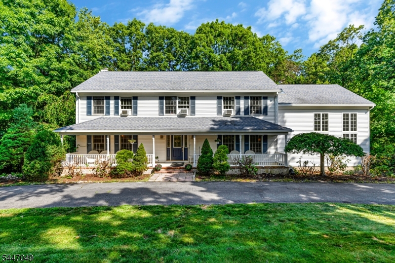 Imagine sitting on your very own rocking chair porch, relaxing on a warm summer nights. This spacious colonial offers 3494 sq ft of living space with 4 bedrooms and 3 full baths. Inside, the large two-story family room with stone fireplace gives you plenty of room to unwind or entertain. The eat-in kitchen offers Silestone counters, SS appliances, and a breakfast bar. The 1st floor room with an en-suite bath is ideal for an office, a play room, or a guest room. The 2nd floor offers the primary bedroom with large en-suite bathroom and a loft area. 3 more generously sized bedrooms and a full bath complete the 2nd floor. Out back, a large deck is perfect for summer nights and weekend gatherings, with a fire pit for cooler evenings around the fire. Close to Rt 80. All rooms except FR and bathrooms are freshly painted.