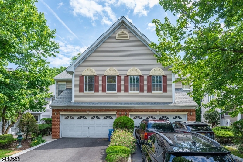 Welcome to the largest townhome model in Stonebridge at Wayne, ideally situated on a quiet cul-de-sac. Freshly painted throughout, this spacious home offers an open and inviting floor plan designed for comfortable living and entertaining.The main level features a center-island kitchen equipped with a Sub-Zero refrigerator, seamlessly opening to the family room with a beautiful stone gas fireplace. Sliding doors off the kitchen lead to an oversized upgraded deck with a built-in gas line for grilling (gas grill included), overlooking peaceful wooded parkland for added privacy and scenic views. The first floor also includes a formal living room, formal dining room, and powder room.The fully finished walk-out basement provides additional living space and features a charming gas pot-belly stove, perfect for recreation, entertaining, or a home office.The second level offers four generously sized bedrooms, two full bathrooms, and a convenient laundry room. The primary suite includes a jetted tub, which is being conveyed in as-is condition.Residents enjoy access to community amenities including walking trails, tennis courts, and professionally maintained landscaping. Conveniently located near shopping centers, hospitals and medical facilities, schools, houses of worship, and NY/NJ public transportation, this home combines comfort, convenience, and an exceptional location.