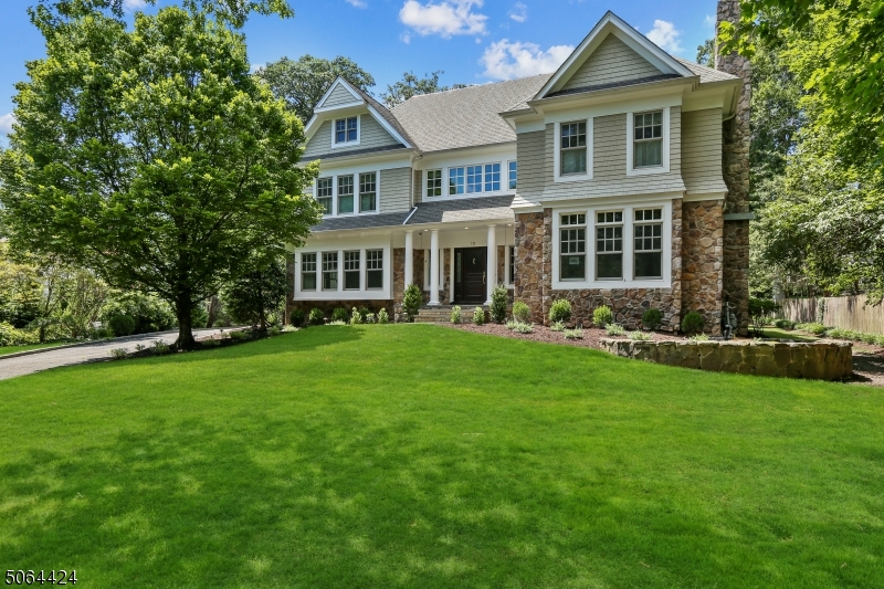 Don't miss this stunning transformation! Prime Northside location. This revamped, freshly painted Center Hall Colonial was masterfully built new in 2004. No detail has been spared in the ceilings, moldings, wainscoting, inlaid floors and more. 7200 sq ft of living space plus 2700 sq ft of storage in walk up attic. Tax appeal in progress. Walk to Town ,restaurants , schools and NJ Transit. 15 minutes to Newark Int'l Airport and 10 minutes to the Short Hills Mall. A one of a kind home not to be missed!