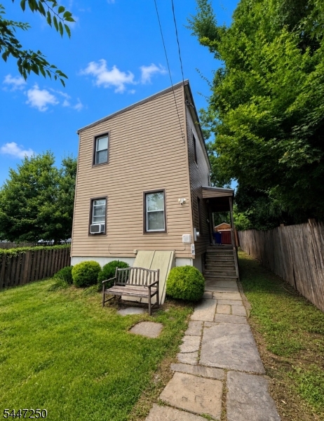 Welcome home to this charming 2-bedroom, 1-bathroom condo alternative single family home that offers the perfect blend of comfort, convenience, and value. Featuring a spacious eat-in kitchen, large living room filled w/ natural sunlight, and a full basement with endless potential to create additional living space, this home is full of possibilities. Enjoy relaxing on the covered front porch or entertaining in the expansive private backyard. A generous sized driveway provides ample off-street parking, adding to the home's everyday convenience. Ideally located close to public transportation, shopping, dining, and everyday amenities, this property offers both a prime location and exceptional opportunity. Don't miss your chance to make this must-see property your new home!