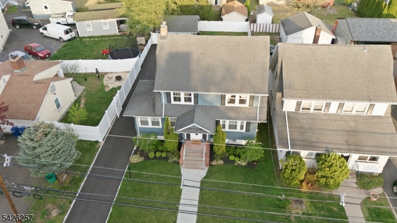Charming colonial-style single-family home located in a quiet residential neighborhood of Hawthorne. This well-maintained property offers approximately 1,600+ square feet of living space with classic architectural character throughout. The home features a traditional layout with generously sized rooms, abundant natural light, and timeless details. Set on a nicely sized lot, it includes a large private driveway and a spacious, nicely maintained backyard ideal for outdoor enjoyment, entertaining. Conveniently located near schools, parks, houses of worship, shopping, and major transportation routes, and just a short distance to the NJ Transit train station with direct access to New York City, this property offers an easy commute while still enjoying suburban living. A perfect opportunity to make this beautiful house yours.