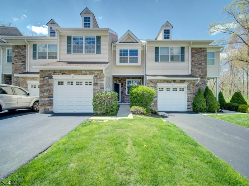 Pristine 3 BR, 2.5 bath Townhome! Fabulous eat-in kitchen with granite, stainless appliances, gorgeous hardwood floors, open to Family Rm with deck backs to woods for wonderful privacy! Spacious formal Dining Rm/ Living Rm with lots of natural light. Second level Primary Bedroom with terrific En Suite Bath, 2 additional bedrooms, main bath, attic for storage. Walkout Basement with high ceilings perfect for storage. Come enjoy all the amenities and relax by the pool, club house, tennis, basketball, playground. Easy for commuting! Requirements: NJAR application, NTN report, employment verification. credit score of at least 700 and income 3:1 to be considered. Tenant responsible for first $100 of repairs and tenant's insurance required. $240 Sewer/Water bill charged to tenant quarterly. Photos are pre-current tenant.