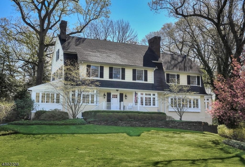 Exquisite 1906 center hall Dutch Colonial home overlooking spectacular property on Summit's prestigious Northside.  An extensive renovation in 2005 included a 4-story addition which preserved the elegance and charm of the original home while adding modern conveniences. The flowing floor plan includes a grand Foyer, formal Living rm w/wood burning fpl, sunken Library w/gas fpl & cove ceiling, Sunroom, formal Dining rm, large Kitchen w/center island and eating area, Kitchen Office, Family rm w/coffered ceilings & gas fpl, Butler's Pantry & Wet Bar, Mudroom & Powder rm. Beautiful grand staircase leads to 2nd floor Master bedroom suite w/gas fpl, duel walk-in closets, Master Bath w/balcony, 3 additional Bedrooms, Full Half Bath, Jack & Jill Full Bath and Laundry rm. The 3rd floor offers 1 Bedroom suite w/Full