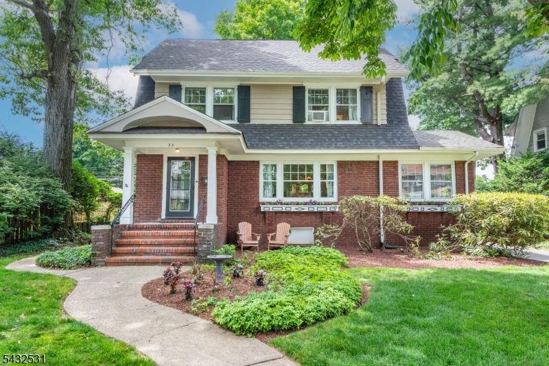 Location, Location, Location!  This beautiful Montclair 1920s Colonial is right smack in the middle of town and on one of the prettiest treelined streets.  Not far from anything - Watchung Plaza Train, Bus, Shops, Cafes - 105 acre Brookdale Park & Golf course/pool club are one block in either direction.  Surprisingly large home has spacious rooms and gorgeous light, and sits on a large grassy lot with room for everyone for outdoor fun this summer.  The first floor features a large living room with entrance vestibule, an updated kitchen, powder room, sun room and large formal dining room.  Original details are a notch above, including elegant crown, built-ins & special leaded glass window design.  Second floor holds 3 good sized bedrooms and a hall bath, while the 3rd fl features a 4th large bedroom & full bath (primary suite potential!).  Basement rec room & laundry, large 2-car garage w opener & whole house generator round out the quality of life here in your new Montclair home!