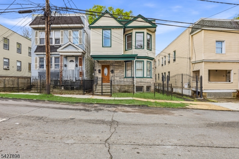 REDUCED INTEREST RATE FOR QUALIFIED BUYERS! Reach out to the listing broker for more details. Welcome to 37 Tichenor Ter, a beautifully renovated 2-family home offering modern updates, functional layouts, and strong multi-family appeal in Irvington. Each unit features two spacious bedrooms and one full bathroom, complemented by bright Living/Dining Room combinations and well-designed kitchens equipped with stainless steel appliances and clean contemporary finishes. Both units also include a den and offer a unique layout where the primary bedroom features additional office space, providing flexibility for work-from-home needs or added comfort. A full unfinished basement offers additional storage potential, completing this well-rounded property. With its thoughtful renovations, practical layouts, and excellent opportunity for both homeowners and investors, this move-in-ready multi-family stands out. Grab it before it's gone!