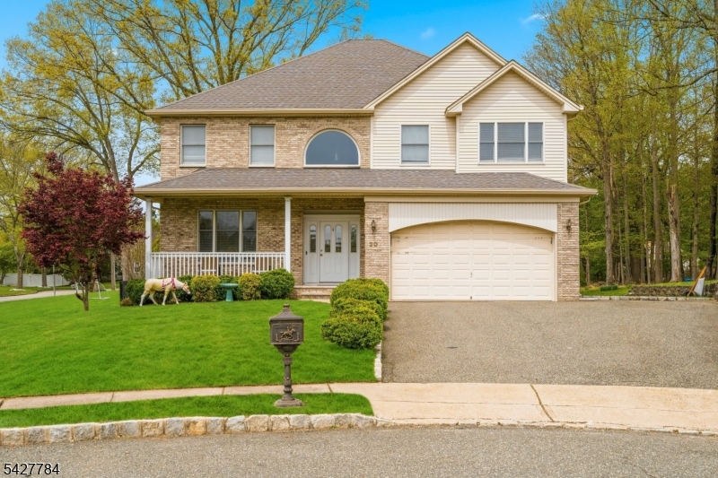 Welcome to this impeccably maintained center hall colonial which is ideally situated on a private cul-de-sac in a highly sought-after neighborhood. The interior features a dramatic two-story foyer, formal dining room, and generously sized bedrooms throughout. The gourmet kitchen is equipped with a breakfast area, tile flooring, stainless steel sink, wood cabinets, new dishwasher, and built-in microwave. Additional highlights include gleaming hardwood floors, paddle fans in most rooms, elegant arched doorways, 9-foot ceilings, and a gas brick fireplace, recessed lights and tiled floor in the sun-drenched family room. Comfort is ensured with multi-zone gas hot water baseboard heating, along with newer furnace and newer hot water heater. The luxurious primary suite features a gorgeous bathroom including a soaking tub, stall shower, dual sinks, and a walk-in closet. Recent upgrades include a beautifully finished walk-out basement offering a spacious recreation, media, exercise or bar area, recessed lighting, laminate flooring and a private office, den or card room perfect for work or play. Step outside to enjoy the in-ground heated pool, expansive patio,  over 1/3 acre of level property and fenced pool area-  ideal for entertaining. This exceptional home offers space, style, and modern updates this home has it all! Please note the schools are Boonton schools.