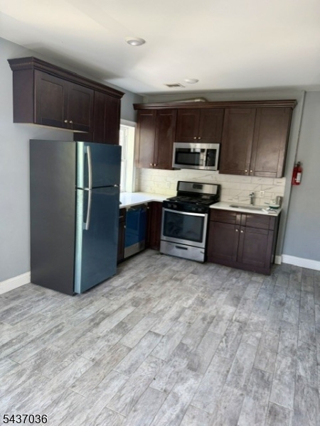 Updated 3 Bedroom In Desirable Morristown!!!  Detached Garage, Newer Flooring & More!! Great Rental!!! Must See!