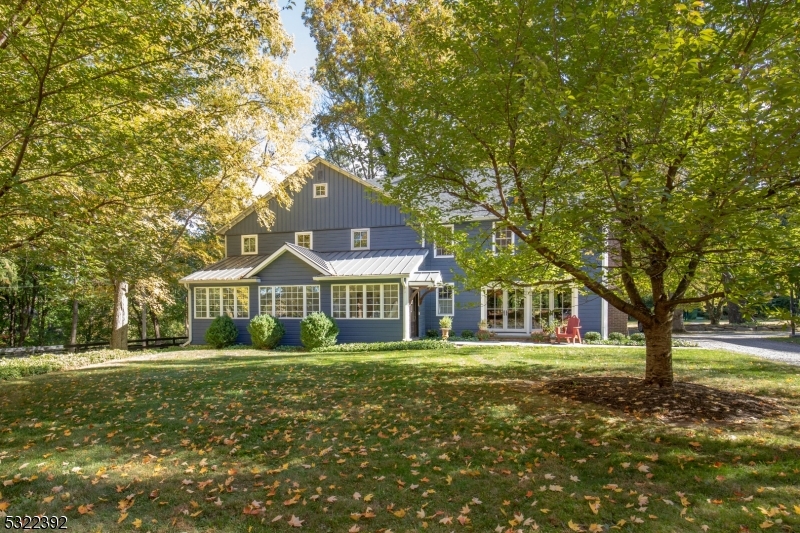 Set beautifully off of a private drive, this fully renovated farmhouse has a wonderful and open floor plan and many unique characteristics, including original wide plank flooring, cathedral ceiling in primary bedroom, multiple outbuildings and putting green. The property is tucked away in a beautiful meadow with outbuildings that include two 1 car garages and a party shed with patio. An antique gem in a great and convenient location!