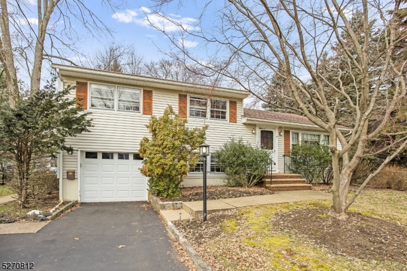 All Offers Due by Tuesday March 5th at 2pm  Make this one your own to update and enjoy.  Builders take note; a great level lot on a sought after street so close to major highways, 24, 287, 10  and the center of town  Large split level with 3 beds 1.1 baths, hardwood floors, sun porch with wood burning stove adjacent to the deck.  Large open back yard.  1 car attached garage.  Do not wait take action now to view and purchase this home.