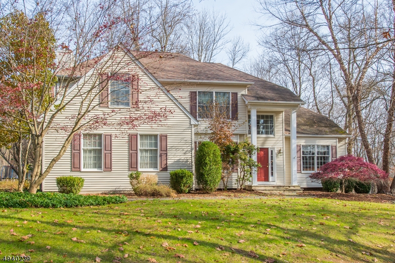 Privacy abounds in this younger colonial in the Cucinella school district, but also a convenient valley location.  5 Minutes to Chester, this home boasts an open floor plan, hardwood floors, center island kitchen, sliders to large, 2 tier deck and expansive, level yard for all of your outdoor activities.  A private home office/study is conveniently located on the first floor. The second floor leads to a spacious master suite features a sitting area and full bath with tub and shower and three additional bedrooms.  Walk-out basement with exercise room and rec room creates additional living space.  Abundant storage, flexible floorplan, low-maintenance exterior, private lot, award winning West Morris Central High School make this home perfect for everyone!