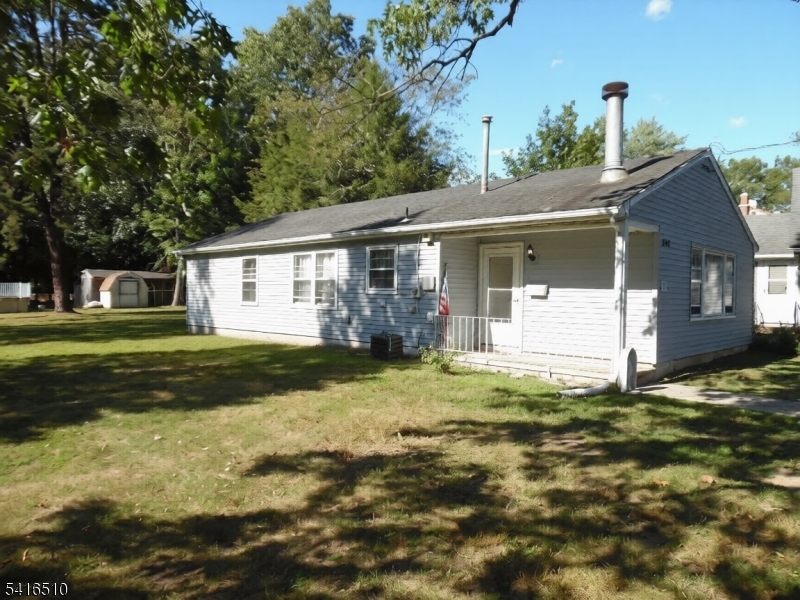Stunning, newly renovated ranch on a spacious lot. This move in ready home offers 3 bedrooms, an updated bathroom, and a dedicated laundry room. Enjoy a cozy fireplace, modern kitchen with brand new appliances, and new A/C unit. Home equipped with Smart Technology: faucets, refrigerator, smoke/co detector, and thermostat-bringing convenience and efficiency to everyday living. The large backyard features an above ground pool with a cleaning robot, plus 2 sheds and an attic for ample storage. Located in a desirable commuter-friendly neighborhood near shopping, schools, and NYC transit. Ideal for commuters. Priced to Sell,  Present All Offers !!!