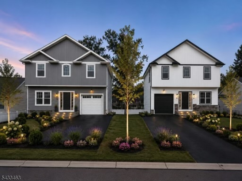 "2026 New Construction". Colonial style home with 9' ceilings throughout. Open-floor-concept flows the family room into an eat in kitchen with 42 inch cabinets, granite counter-tops, backsplash & stainless steel appliances. Hardwood floors throughout. Decorative molding throughout. Decorative tile designs. Master bedroom offers tray ceilings and full bathroom. Ground level 5th bedroom or Den. Fully finished walk out basement. Paver-stone patio.