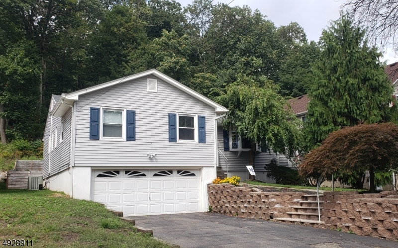 Welcome home and enjoy everything White Meadow Lake has to offer!  Move right into this immaculate 3 BR and 2 Ba Ranch. Main floor features a sunny living room with fireplace, spacious dining room. Eat in Kitchen with newer appliances and large pantry.  Recessed lighting and hardwood throughout.   3 Seasons Porch walks out to large fenced in deck.  Fully finished basement holds dry bar and laundry.  Brand new Roof (4/19) and new hot water heater (2018). Plenty of storage and complete with built in 2 car garage.  Full access to WML Community with lake and clubhouse privileges, minutes from major highways to NYC and shopping, nothing to do except move right in!