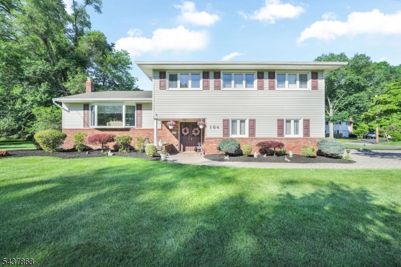 From the moment you approach the elegant double front doors and step onto the welcoming front stoop, you'll feel it, this home was truly loved. Immaculately maintained by its current owners, 184 Andover is move-in ready with freshly painted walls, gleaming hardwood floors throughout, and every detail carefully tended.  Inside, a spacious foyer sets the tone. The chef's eat in kitchen impresses with granite countertops and an abundance of prep space, making everyday cooking a pleasure. The formal dining room is bathed in natural light from a generous picture window   ready for every holiday and dinner party you can imagine.  The primary suite offers a private bath and walk-in closet, providing a true retreat at the end of the day. The tiled basement is a versatile bonus space perfect for a den, home office, or gym.  Step outside to your own private retreat: a paver walkway and driveway lead seamlessly to a beautifully crafted paver patio with an awning   perfect for relaxing in the shade on summer evenings. A storage shed rounds out the outdoor space. The property sits on the corner of a quiet cul-de-sac, offering extra privacy and pride of place. Walk to NYC Transit, Whole Foods at Valley Ridge Shopping Ctr. & Lafayette Elementary.  Near AWMS , Wayne Valley HS, James Roe Pool, Michael Kilroy Memorial Park, Trader Joes, Wayne Community Center and more! The neighborhood has flat streets with sidewalks and an active, welcoming neighborhood. This one will not last.