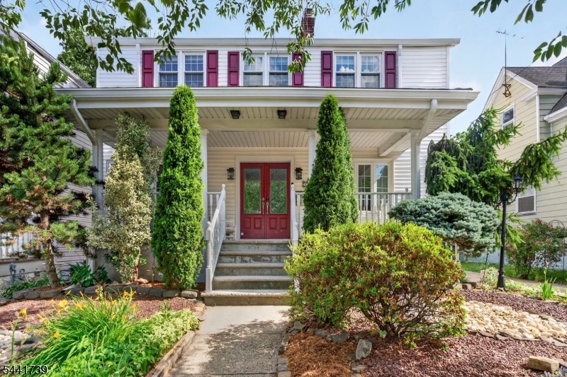 Welcome to this timeless Colonial, where classic charm meets thoughtful updates in a home designed for comfort and convenience. Nestled on a quiet one-way street, the inviting front porch leads into a sun-filled interior with hardwood floors and a cozy wood-burning fireplace anchoring the living room. A formal dining room sets the stage for gatherings, while the well-planned kitchen offers a pantry, ample workspace, and easy access to the laundry room and backyard. A versatile first-floor bedroom provides flexibility as a guest suite, office, or den. Upstairs, three spacious bedrooms include a distinctive primary suite with exposed stone accents and a custom walk-in closet with sliding barn door. Another walk-in closet offers abundant storage and potential for a future third bath, complementing the beautifully renovated full bathroom. The full unfinished basement features a workshop, storage, and walkout access, ready for expansion. Outdoors, the landscaped, fully fenced yard creates a private retreat with space for entertaining, play, or relaxation, enhanced by a storage shed and oversized driveway. Updated mechanicals, multi-zone central air, and a waterproofed basement add peace of mind. Ideally located just minutes from Kings Food Markets, Home Depot, parks, restaurants, shopping, fitness centers, and NJ Transit with easy NYC access, this exceptional Garwood home blends character, comfort, and future potential in one perfect package.