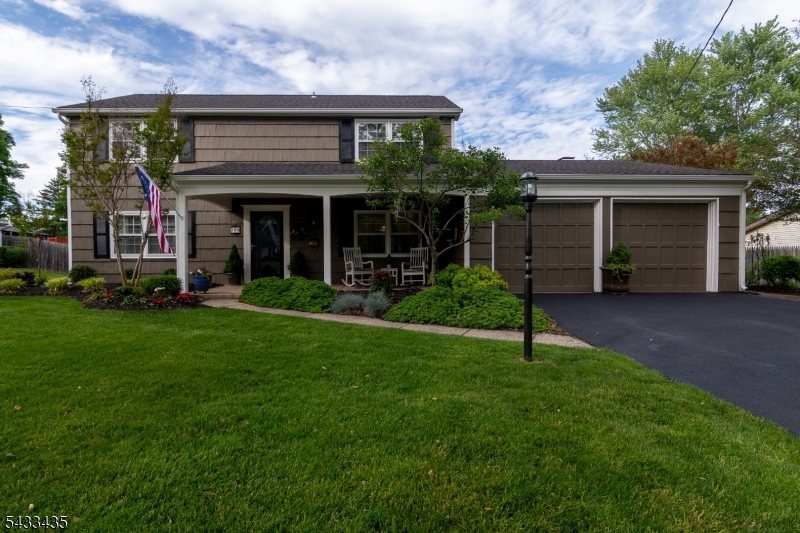 Welcome to this pristine, meticulously maintained 3 bedroom Center Hall Colonial, where true pride of ownership shines throughout. Beautifully updated and thoughtfully designed, this home offers both timeless elegance and comfortable everyday living.The spacious kitchen with separate dining area opens to an oversized 500 sq ft great room, creating a seamless open floor plan ideal for entertaining and gatherings. Formal living and dining rooms provide additional space for hosting and everyday enjoyment. A door leads to the patio and private backyard oasis surrounded by luxurious landscaping.The first floor office with ample closet space offers flexibility for working from home, guest space, or additional living needs.Upstairs, you'll find 3 generously sized bedrooms and updated baths designed with comfort and style in mind.Perfectly located for today's lifestyle, this commuter friendly home is close to shopping, dining, local hospitals, and train access. 2nd owner, new roof added 2 yrs ago & new hvac in 2019.