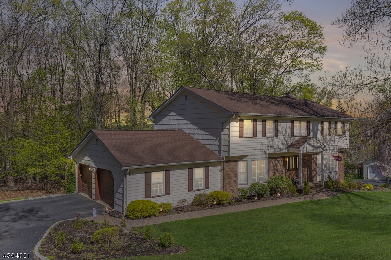 Amazing Location in the desirable Birch Run section of Denville! Spacious Home, 4 Large Bedrooms and 2.5 Baths.  Features an Eat In Kitchen with Granite & Tile which was updated in 2009. Upstairs bathroom updated in 2019 and it is stunning!  Other bathrooms updated in 2014.  Formal Living & Dining Rooms, Family Room with Fireplace.   Separate Large Sun Room added on in 2001 with views of the woods.  Central Air updated in 2014.  Expansive Master Suite with Walk in Closet & Full Bath, Hardwood Flooring, Deck, Covered Front Porch, Sprinkler System, and Alarm System.  Basement finished including a separate space for your home gym and separate entrance.  Walk to local Farm for fresh produce.  Priced to sell!