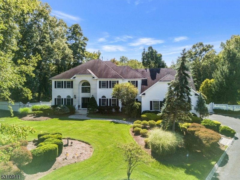 This spectacular custom colonial home in The Beacon Manor section of The Hills has five bedrooms and five and one-half bathrooms. It faces Northeast and offers a range of features, including an in-ground pool, spa, and a flat fenced-in rear yard, perfect for playground and parties. The gourmet eat-in kitchen is equipped with stainless steel appliances and a walk-in pantry and opens to a stunning two-story family room. A spacious home office completes the first level. The primary bedroom ensuite has a vaulted ceiling, a sitting area, and two walk-in closets. There are four more bedrooms, three of which have full baths. The fully finished open-concept basement includes a full bath, lounge area, game area, fitness room, and storage. The basement has direct stair access to the expansive three-car garage. Recent interior painting, as well as hardwood refinishing. Newer carpeting on bedroom 2nd floor and the lower level. Other property features include a fenced-in pool area. This is truly an outstanding opportunity you wouldn't want to miss! Highest and best offers are due on 9/25.
