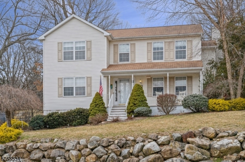 Expect to fall in love!!! Bright, airy, maintained with love, and offering seasonal lake views colonial on cul-de-sac street is waiting for you!!  First floor features: kitchen with breakfast bar, center island & pantry; large living, dining rooms; family room w/gas fireplace; powder room, and foyer opening up to a deck, mostly hardwood floors throughout this level.  Second floor offers: master bedroom with walk-in closet, beautiful updated bath with a great shower; three additional bedrooms, one of them being used as an office, main bath.  All rooms are spacious and feature large windows letting plenty of light in. Basement provides plenty of storage space and can be finished the way you want it.  Deck, patio, fenced in yard, two car garage, generator hook-up, and more! complete the picture of perfection!