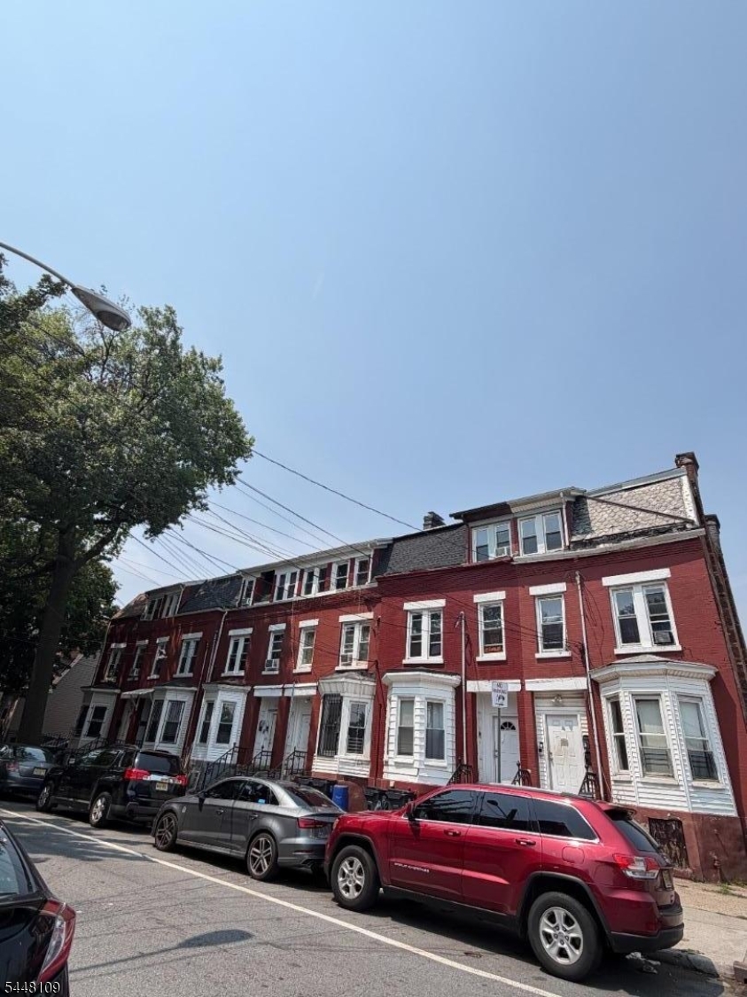 Welcome to this stunning brick brownstone nestled in the heart of Newark, NJ. This fully updated 2-unit multifamily exudes that coveted NYC and Jersey City brownstone charm, sitting on a 17.3x100 lot featuring a full basement and parking. Thoughtfully renovated in 2025 with modern finishes throughout, this property offers generous living space across both units, with both currently tenant occupied and generating consistent rental income from day one. Perfect for the seasoned investor seeking immediate cash flow or an owner-occupant looking to live in one unit while collecting rental income from the other. Experience the charm and character of classic brownstone living at a fraction of NYC and Jersey City prices with low 2025 taxes. Conveniently located with easy access to major highways and NJ Transit for a seamless commute to NYC. Property can be purchased individually or as part of an exclusive package deal with 4 additional side by side brick brownstones on S 12th St totaling 5 properties. Opportunities like this do not last. Schedule your showing today.