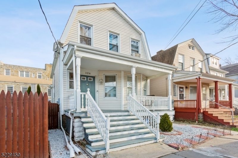 Detached home with easy access to everything!  Well-maintained Colonial offers two bedrooms, one full bathroom and a office/guest room on a quiet, tree-lined street in Irvington. Situated in the heart of Essex County, this home is ideal for commuters traveling to midtown Manhattan and all areas of New Jersey with quick access to the Garden State Parkway and other major roadways, including Routes 280, 78, and 22. Schools are only about half a mile away, with stores, restaurants, and parks all within easy reach. A welcoming front porch brings you inside to hardwood floors and light-filled rooms including a large living room, a dining room, and an eat-in kitchen featuring granite countertops, tile backsplash, stainless steel appliances, and plenty of cabinet space. From the kitchen, step outside to the large deck in the deep and fully fenced-in back yard " perfect for warm weather cookouts or relaxing around a fire pit. The second floor consists of the primary bedroom with a large closet, one additional bedroom, a convenient room that could be use as an office or guest room, and a full hallway bathroom. A full basement with a laundry area offers lots of storage and vast possibilities. 2021 ROOF.