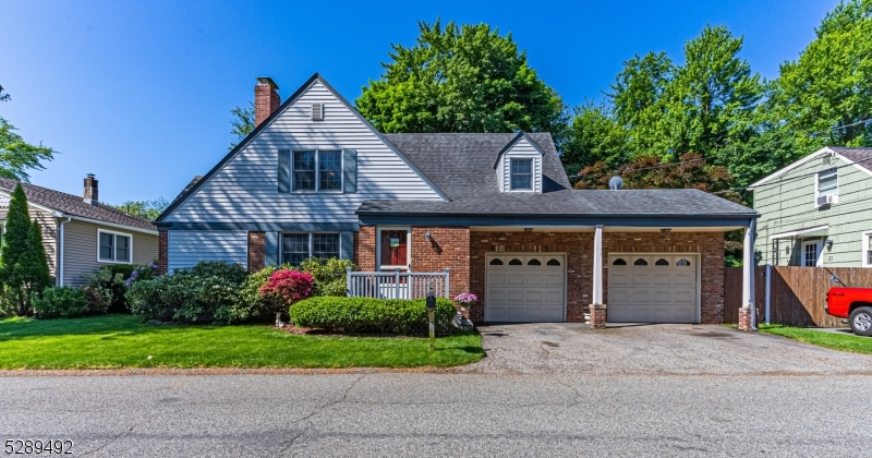 Welcome Home! Charming Colonial on a beautifully landscaped level lot in the sought after Indian Lake community of Denville. Move right in and enjoy summer at the Lake. Pride of ownership shines! Immaculate & carefully thought through & cared for by the same owners for 20 years. Lots of Generous Room Sizes to Spread Out & Make Your Own! Comfortable, Spacious Floor Plan. Many Appealing Features Throughout. Stunning hardwood floors, low maintenance laminate flooring in kitchen, double insulated vinyl windows & newer mechanicals! Just to name a few! First floor offers your classic & highly functional layout. Formal living room & dining. The kitchen overlooks the backyard & sunroom with walls of windows. Powder room & garage entrance. Upstairs, 3 generous sized bedrooms & an updated full bath. Tons of storage space in the two car garage, two sheds, two attics, large closets and unfinished partial basement. Backyard OASIS - Perfect for Entertaining & Relaxation! Enjoy the large deck, awning and hot tub. Paver patio and gorgeous gardens with perennials. Brand new in-ground sprinkler system. Make this your STAYCATION. Great home, lot & condition. Leaf filters on gutters. Fantastic location; walking distance to Indian Lake Bistro, Gardner Field, beaches, swimming, boating, playground and fun! Minutes from downtown, NYC commuter locations for both bus and trains. Easy access to major highways. Top Rated Schools!