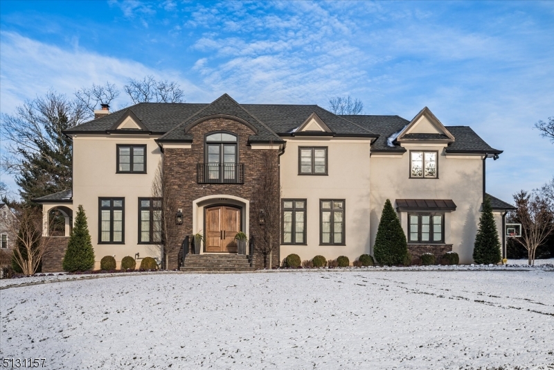 Perched on a private 0.5 acre lot in the Fairfield section of Short Hills, this spectacular 7000+sf custom smart home (Elan system) features high-end finishes throughout its inviting, open floor plan.  Soaring 10" ceilings, brand new custom chef's kitchen, thoughtfully designed butlers pantry and luxury living continue through the main floor and beautifully flow from formal living spaces into more intimate family spaces.  The gourmet kitchen features custom cabinetry with European style inset doors and drawers, Quartz countertops, marble backsplash and a 10" waterfall center island that's ideal for entertaining and family dining. Top of the line appliances include Wolf range & double ovens, side by side Sub Zero fridge and separate freezer, plus two Fisher Paykel & Cafe dishwashers and double sinks. Designed by Byrne Design associates, this designer's own home features custom wall coverings and curated light fixtures.  The home feels both welcoming and grand! 6 bedrooms, each with its own custom walk in closets and en suite bathrooms (one bedroom shares a jack-and-jill bathroom).  The totally level half-acre property, backyard bluestone patio and built-in gas grill are perfect for summer entertaining! Generator, wireless, automated security system, high-end finishes throughout! The home will wow even the most discerning clients. RECORDED FOR COMP PURPOSES