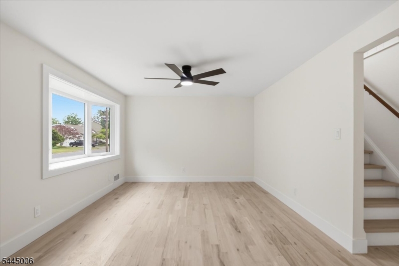 This beautiful 2-bedroom, 1-bath home offers approximately 1,120 square feet of thoughtfully updated living space, featuring a flexible floor plan with opportunities to customize rooms to fit your lifestyle, including potential for additional sleeping or living areas within the existing footprint. This move-in-ready home renovated in 2026, features a bright and inviting layout with new flooring, fresh paint, updated trim, and a stunning kitchen complete with quartz countertops, modern cabinetry, stainless steel appliances, and central air conditioning for year-round comfort. The finished basement provides valuable additional living space, featuring a versatile bonus room that's perfect for a home office, guest space, playroom, gym, or media room, along with ample room for recreation and storage. Step outside to a generously sized backyard with endless possibilities, perfect for entertaining, gardening, outdoor activities, or creating your own private outdoor retreat. Conveniently located near shopping, restaurants, parks, major highways, and public transportation, this turnkey home blends modern updates with everyday convenience. Not located in a flood zone.