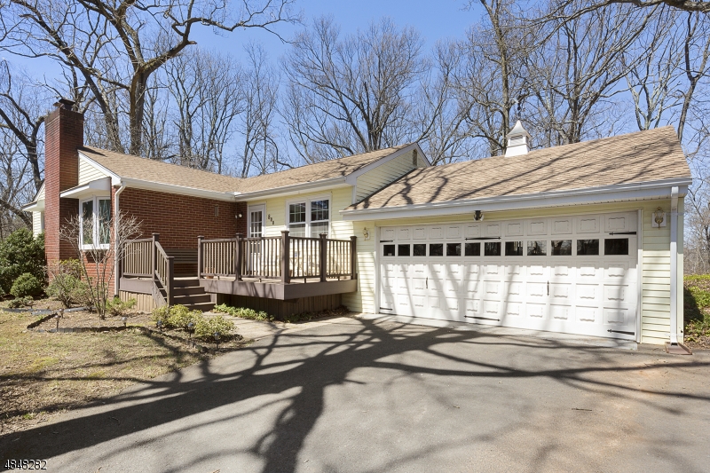 Amazing Value!  Renovate Ranch style home on a quiet private road with beautiful yard and lots of indoor & outdoor entertainment space!  Full walkout basement that is huge and fully renovated! Hardwood Floors throughout the home and a brand new waterproof laminate in the lower level was just installed (2018).   New kitchen and bathroom in 2017.  Custom cabinets and granite countertops with breakfast bar make this a great place to enjoy your time at home. Roof, windows, gutters and doors were all replaced in 2015. Wired generator installed in 2015 as well so you never have to worry about losing power. The finished basement features an in-law suite with a 2nd Kitchen, bathroom, den, office/bedroom and walkout to patio!  Pride of ownership shows in this home!