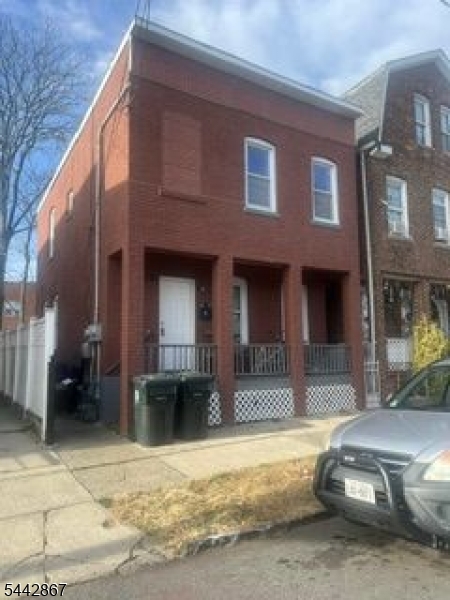 Great investment property. Good location close to train, bus line and shopping. Both apartments have  been nicely updated and have central AC. Relax on the open porch or in the fenced yard. All separate meters tenants pay all including water, they are also responsible for maintaining the ground and snow removal.