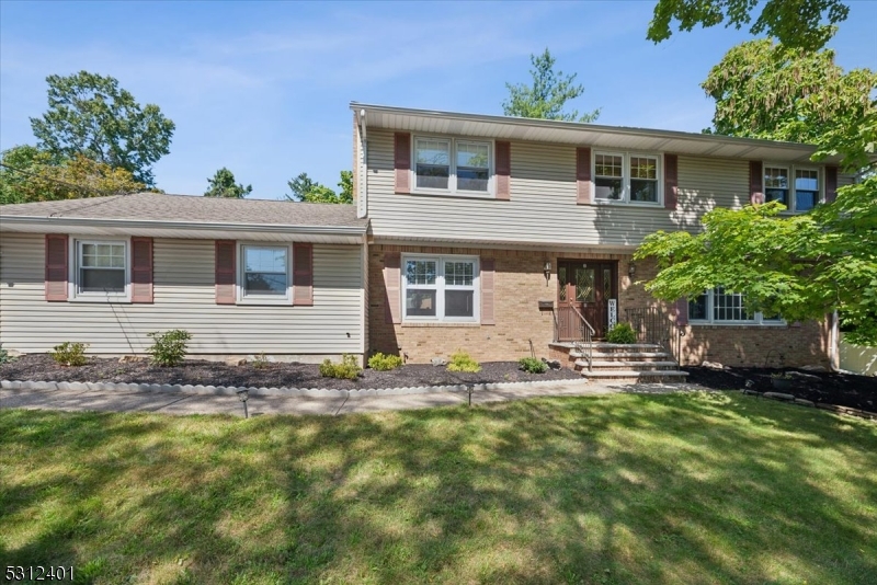 If space is what you're looking for, look no more! Move right into this bright & sunny 5 bed/3.5 bath/2-car garage Center Hall Colonial w/fully finished basement & serene backyard on a quiet cul-de-sac in the heart of Wayne. Walk into the foyer of this home to find a formal living room to the right through French doors & a classic family room to the left with a brick fireplace & sliders to backyard. You find a large eat-in kitchen from the living room w/ample storage, counter space, double oven, custom tile work & bay window. A formal dining room sits just off the kitchen & connects to the living room via decorative archway. On this floor you have access to a finished oversized 2-car garage w/attic storage, a powder room & laundry room w/storage, extra fridge & backyard access. Upstairs you find 3 sizable bedrooms w/hall bath(tub/shower) & the primary suite w/walk-in closet, dressing area & full bath(shower). Hardwood floors are throughout the main & 2nd levels(under carpet in 2 bedrooms & stairs). The basement offers even more living space with a true 5th bedroom, 2nd family room, full bath, storage/utility room & pantry. Outside, relax at the fire pit, BBQ on the stone patio or play on the raised lawn. PS. There was once a pool, perhaps you can add one back if you desire. Just off French Hill and Apls Rd, you have direct access to routes 80, 23 & 46, top-rated schools & close to NYC trains, about 2 miles to Mountain View or Wayne NJT Stations (Montclair Boonton Line).
