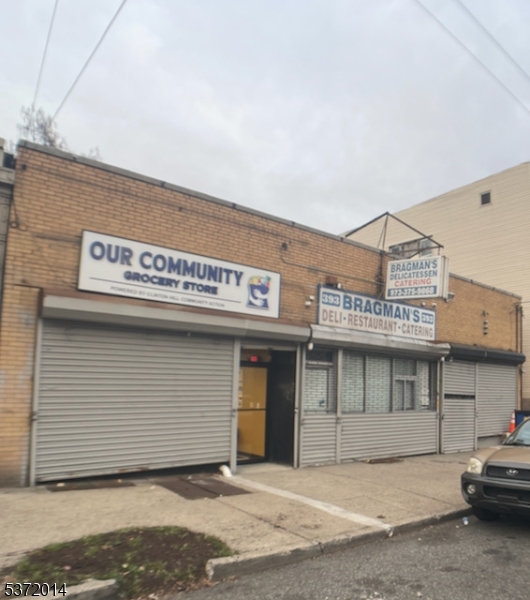 Newark is full of opportunity and 391-393 Hawthorne Ave has become your oyster. The original building of Bragman's is up to date where all you have to do is buy and start collecting rents! If all three units are rented, can easily make $7,000/month. Sorry, THE BUSINESS IS NOT FOR SALE ONLY THE PROPERTY ITSELF!                       STATS AS FOLLOWS: - Two of three units are rented out for the next five years on a NNN w/right of renewal after five years- Each unit pays their own utilities and meters are seperated. Water is divided by the three units - Roof done in 2021 - Newer hot water heaters - Each unit (1,500sqft) has its own basement for an additional 1,000sqft storage space - Unit 1: is occupied by a community grocery store - Unit 2: originally occupied Bragman's Deli (has a walk in cooler, stove, and other equipment may be available)  - Unit 3: occupied - Owner of building has an option to expand w/first right of refusal on buildings next to Bragman's (389 & 395).